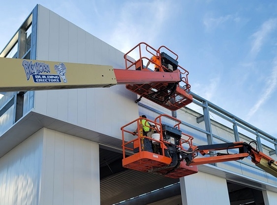 Metal building installer